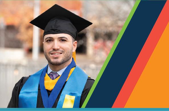 A person in cap and gown posing for a portrait next to diagonal color stripes