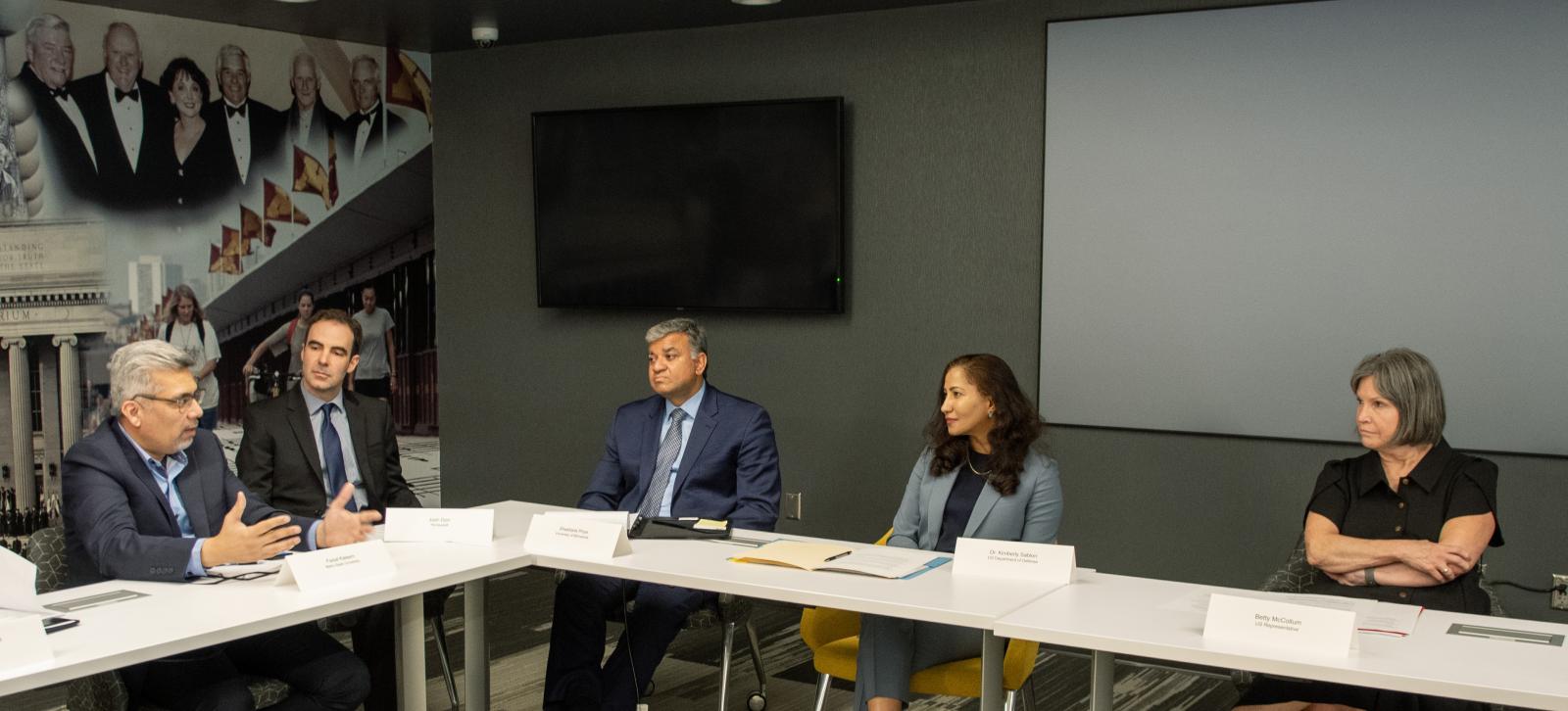 Dr. Kimberly Sablon, principal director for Trusted AI and Autonomy at the Office of the Undersecretary of Defense for Research and Engineering, hears about cybersecurity workforce efforts at Metro State from Prof. Faisal Kaleem in a roundtable with people involved with Minnesota’s high tech industry. Also pictured are Josh Dorr with Honeywell, VPR Shashank Priya and Congresswoman Betty McCollum. Photo courtesy of UMN's Research and Innovation Office.