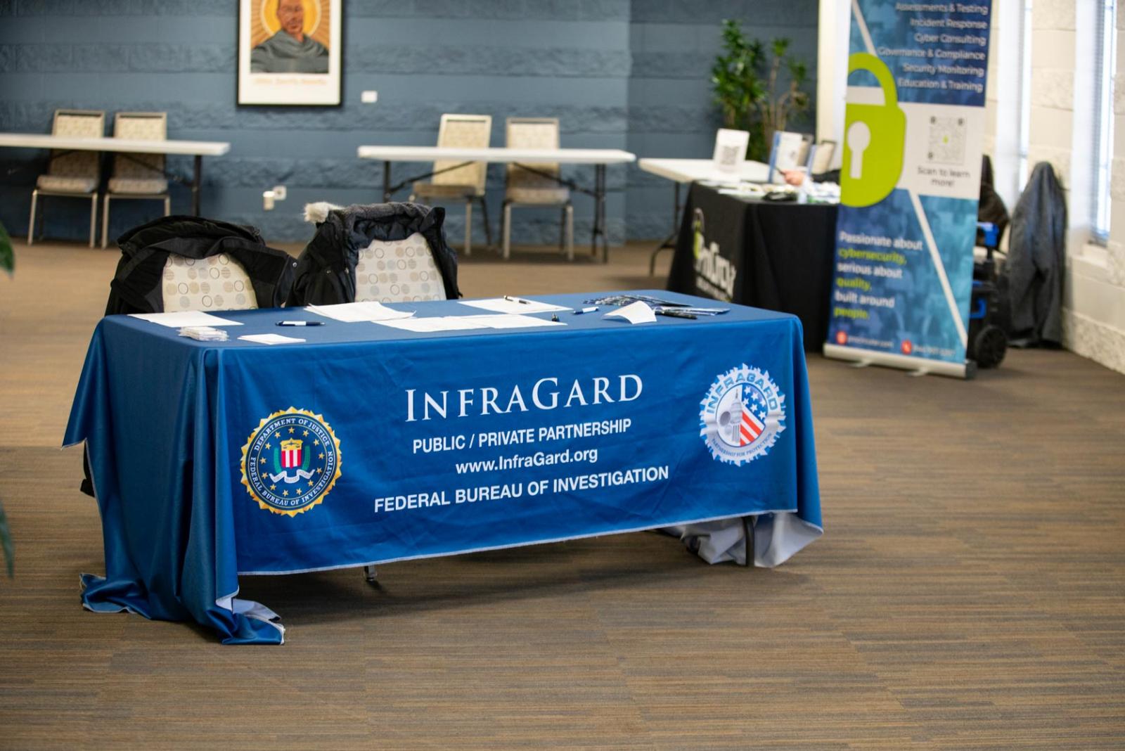 sign in desk for InfraGard, public/private partnership with the Federal Bureau of Investigation